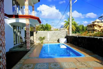 Image de Homerez - Appartement élégant Flic en Flac + Piscine