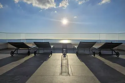 Image de Luxury loft beachfront apartment with jacuzzi, big seaview terrace in Mandre