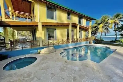 Image de Luxurious Beachfront Windancer Villa/  sleeps 12+/Pool/Jacuzzi/ sleeps 12