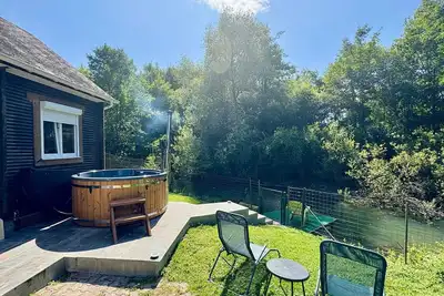 Image de Homerez - Chalet convivial avec vue sur la rivière - 62 m²