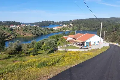 Image de A Carpinteira Lake House - An authentic Portuguese country house by the lake!