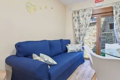 Image de Maison de vacances 'Lago De Sanabria' avec vue montagne, jardin privé et balcon