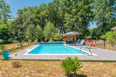 Image de Maison de vacances 'Au Milieu D'un Airial' avec piscine partagée, terrasse privée et Wi-Fi
