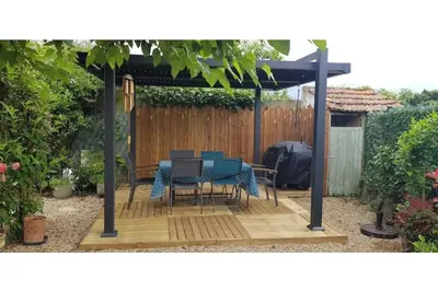 Image de Maison avec jardin / 1 king size - 1 canapé lit