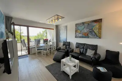 Image de The Deichraum apartment makes your dream of a vacation on the North Sea come true.