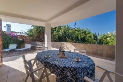 Image de Maison de vacances 'Mirella- Portobello' avec terrasse privée, jardin privé et Wi-Fi