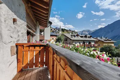 Image de Appartement 'Marmotta' avec vue sur les montagnes, jardin partagé et Wi-Fi