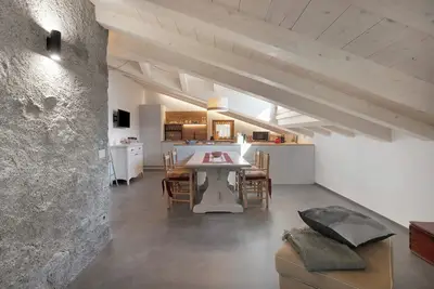 Image de Appartement 'Scoiattolo' avec vue sur les montagnes, jardin partagé et Wi-Fi