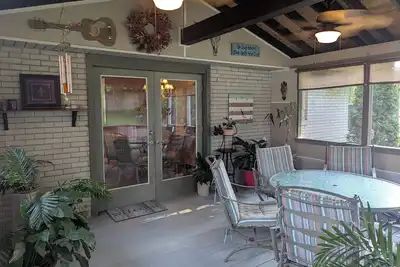 Image de Land O Lakes/4 Bdrm4 Bed, 1. 5 Bath, Screen Patio, Garden View, 3 tvs, wifi