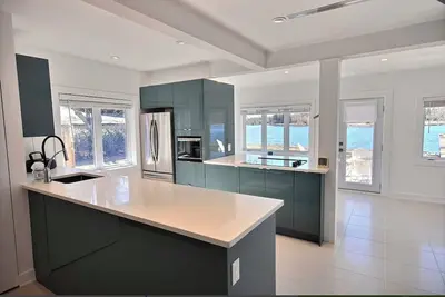 Image de Charming stone cottage with Prime waterfront on Rideau River