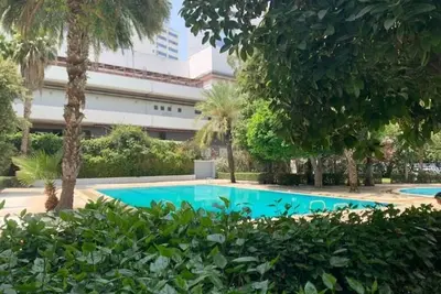 Image de Studio Cosy vu jardin & piscine