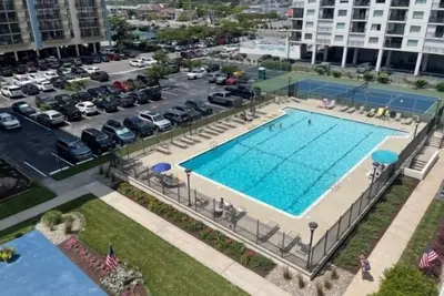Image de 2 Br 2 Ba Ocean Front Condo with side view of Ocean Pool, Elevator, Tennis