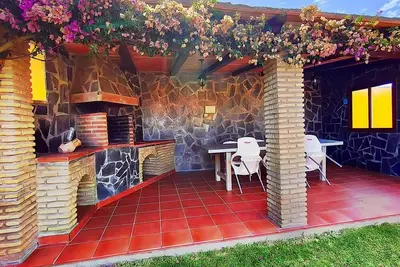 Image de Chalet con piscina y jardín privado, ideal para familias y vacaciones en Conil