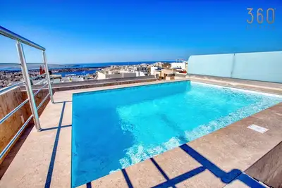 Image de Mellieha 3br home with Rooftop Pool Access w/Ac`s