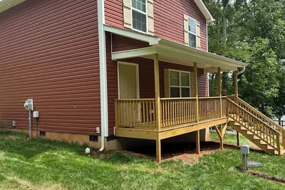 Image de The Red Nest At High Rock Lake - Fire Pit, Front Porch Deck, Sunset & Lake Views