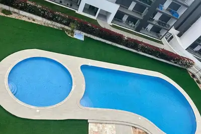 Image de Appartement 'Rocha Sol' avec piscine partagée, jardin partagé et balcon