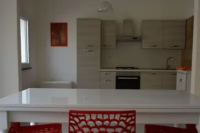 Image de Sant'Antioco appart rouge avec clim bi