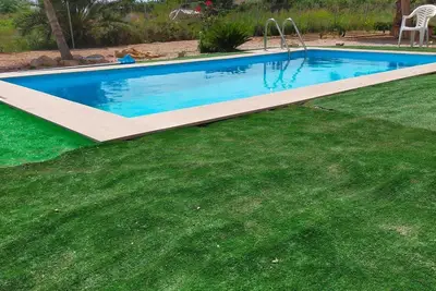 Image de Appartement studio 'Estudio La Cochera' avec piscine partagée, Wi-Fi et climatisation.