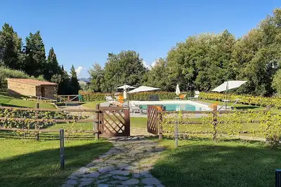 Image de Agréable appartement dans une maison de vacances avec climatisation, Wifi, piscine et Tv