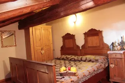 Image de Appartement 'Odorizzi Lago Di Tovel' avec vue sur la montagne et jardin commun