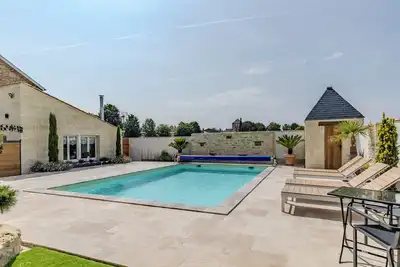 Image de Les Marronniers – Maison de vacances avec piscine et vue sur les vignobles à Montagne