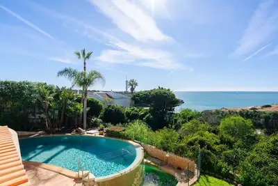 Image de Casa Waldemar, villa de luxe à Ferragudo avec vue panoramique sur la mer