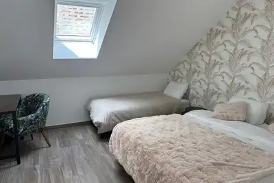 Image de Gîte spacieux avec espace jacuzzi sauna, salle réception et terrasse avec jeux.