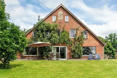Image de Maison de campagne 'Friesenhof' avec terrasse commune, jardin privé et Wi-Fi