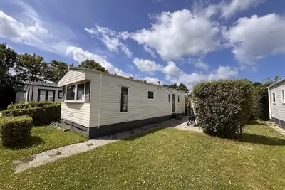 Image de Maison de vacances pour 4 personnes env. 35 qmà Vrouwenpolder, Zélande (Côte de la Zélande)
