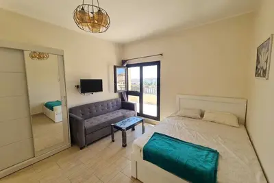 Image de AlDau Heights Modern Studio with Huge Terrace, Mountain & City View