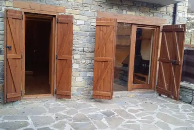 Image de Appartement 'Planta Baja Con Terraza Boi Taull' avec vue sur montagne, terrasse et jardin privé