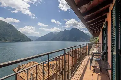 Image de Bright penthouse on Lake Como with breathtaking view.