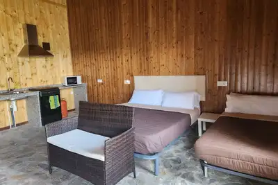 Image de Chambre 'Jardín Habitación Triple B' avec piscine privée, terrasse et jardin partagés
