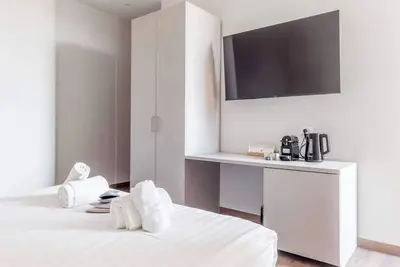 Image de Grande Suite 3 Chambres · Jusqu’à 10 personnes · 2 Salles de bain · Cuisine comp