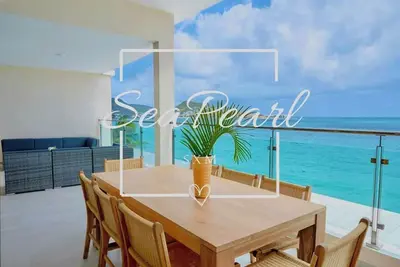 Image de SeaPearl 3br Beachfront Penthouse with Generator