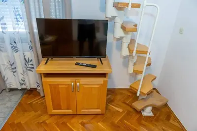 Image de Dvoetažna četverokrevetna soba