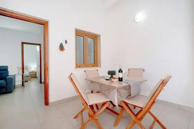 Image de Comfortable 53 sqm apartment, perfect for 4 people, located on the ground floor of a building. The property is located in a residential area of ​​Monopoli, a few minutes from the historic center and the main city attractions, in an area full of servic