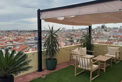 Image de 7-person apartment in central Lisboa with 35m2 roof terrace and panoramic view