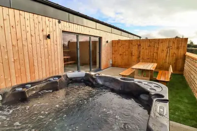 Image de Belle maison de vacances pour 6 personnes avec bain à remous, Wifi et animaux admis
