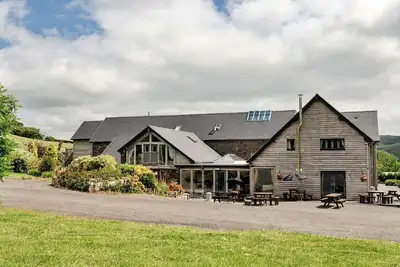 Image de Magnifique maison de vacances pour 19 personnes avec Wifi, bain à remous et animaux admis