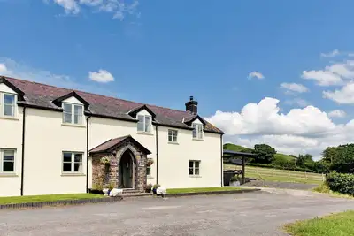 Image de Magnifique maison de vacances pour 12 personnes avec bain à remous, Wifi et animaux admis