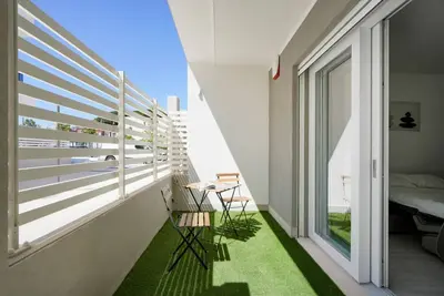 Image de GuestHost - Charming 67 sqm apartment, perfect for 4 people, located on the ground floor of a recently built building. The property is located in a residence with a concierge active all day; outside the house there are gym equipment that can be used freel