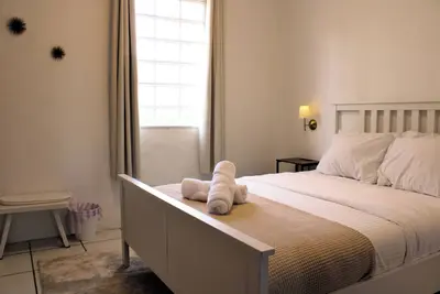 Image de Cozy San Juan Boho Retreat - King Size Bed, Fast internet, Ac, 4 smart tvs!