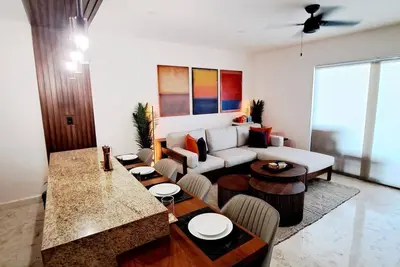 Image de Central 4-bedroom, 3 bath Condo with WiFi, Ac in fantastic Puerto Morelos