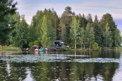 Image de The lake house - boats, beach, sauna and barbecue