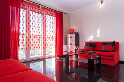 Image de Chełmońskiego 11 Świnoujście | Red Studio with Balcony