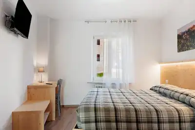 Image de Appartement 'La Canonica Pino' avec vue sur la montagne, jardin commun et Wi-Fi