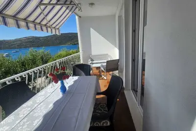 Image de Apartmani Neves - Nice 2-bedroom apartment with WiFi, Ac in tranquil Poljica A1