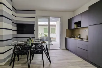 Image de Appartement moderne avec terrasse à Bibione