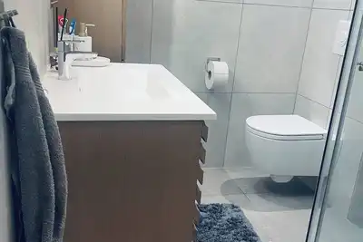 Image de A Bright and Furnished Apartment